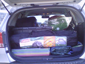camping gear in the back of an SUV