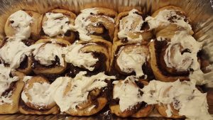 fresh baked bacon cinnamon rolls with cream cheese frosting